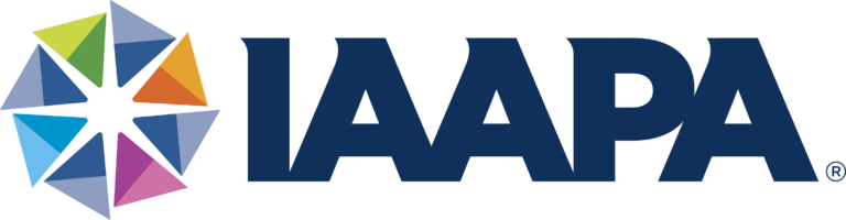 IAAPA colorful logo featuring geometric shapes forming a star, representing the attractions industry's global reach.